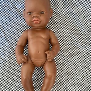 Miniland doll with African features.girl anatomically correct vanilla scent